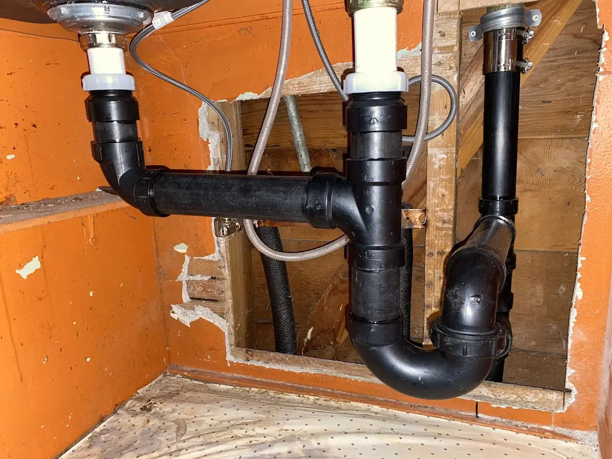 Professional Garbage Disposal Repair equipment and tools on the job in Deltona